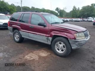 ✅ 2000 Jeep Grand Cherokee Laredo • VIN: 1J4GW48S5YC395355 • Lot: 43038310. Listed on IAAI with 119,051 mi. Free auction sales archive from the USA and detailed vehicle history report at DreamBid. Image 1.