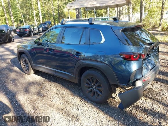 ✅ 2024 Mazda CX-50 S Premium • VIN: 7MMVABDM1RN240444 • Lot: 43410563. Listed on IAAI with 12,648 mi. Free auction sales archive from the USA and detailed vehicle history report at DreamBid. Image 3.