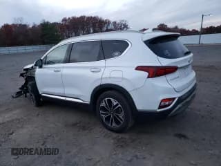 ✅ 2019 Hyundai Santa Fe Ultimate • VIN: 5NMS5CAA2KH018781 • Lot: 77141243. Wystawiony na Copart z przebiegiem 74 421 mil. Bezpłatny archiwum sprzedaży aukcyjnych z USA i szczegółowy raport historii pojazdu na DreamBid. Zdjęcie 2.
