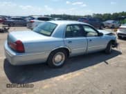 ✅ 2002 Mercury Grand Marquis LS Premium • VIN: 2MEFM75W22X637785 • Lot: 70934295. Listed on Copart with 96,035 mi. Free auction sales archive from the USA and detailed vehicle history report at DreamBid. Image 3.