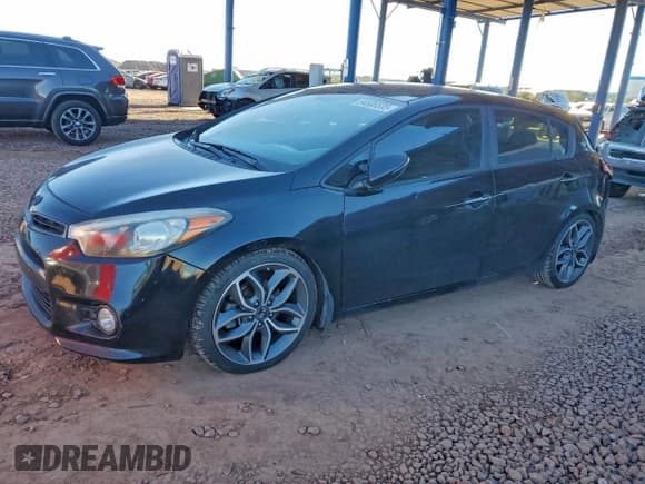 ✅ 2015 Kia Forte SX • VIN: KNAFZ5A30F5282879 • Lot: 94506535. Listed on Copart with 144,636 mi. Free auction sales archive from the USA and detailed vehicle history report at DreamBid. Image 1.