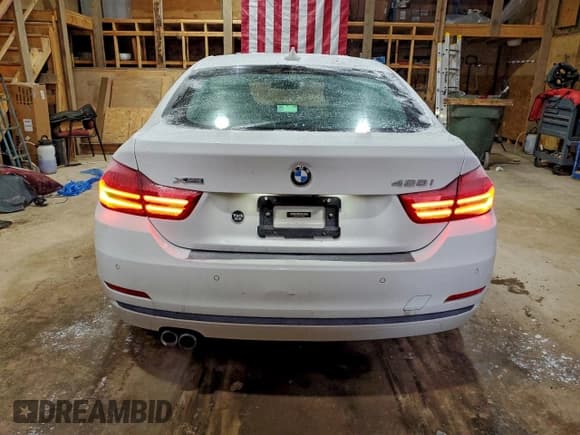 ✅ 2016 BMW 4 Series 428i xDrive • VIN: WBA4C9C57GG141599 • Lot: 95274075. Wystawiony na Copart z przebiegiem 78 927 mil. Bezpłatny archiwum sprzedaży aukcyjnych z USA i szczegółowy raport historii pojazdu na DreamBid. Zdjęcie 6.