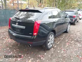 ✅ 2012 Cadillac SRX Premium Collection • VIN: 3GYFNCE3XCS592238 • Lot: 43541237. Wystawiony na IAAI z przebiegiem 189 396 mil. Bezpłatny archiwum sprzedaży aukcyjnych z USA i szczegółowy raport historii pojazdu na DreamBid. Zdjęcie 4.