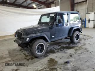 ✅ 2003 Jeep Wrangler Rubicon • VIN: 1J4FA69S13P360267 • Lot: 62077835. Listed on Copart with 88,278 mi. Free auction sales archive from the USA and detailed vehicle history report at DreamBid. Image 1.