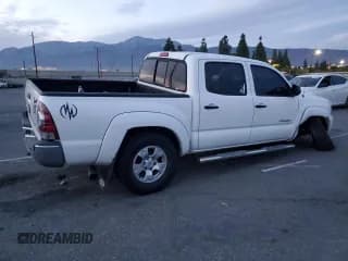 ✅ 2014 Toyota Tacoma PreRunner • VIN: 3TMJU4GN2EM168633 • Lot: 91735725. Listed on Copart with 102,108 mi. Free auction sales archive from the USA and detailed vehicle history report at DreamBid. Image 3.