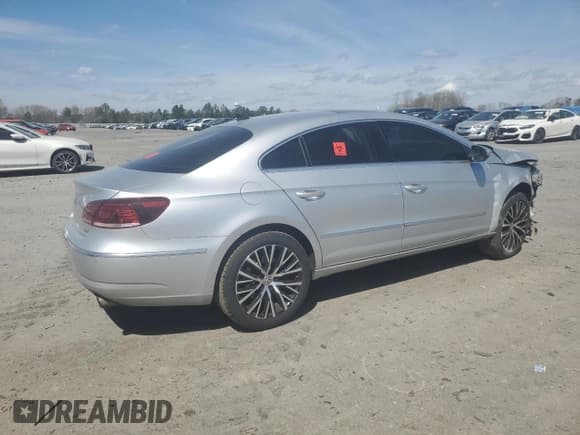 ✅ 2014 Volkswagen CC Executive • VIN: WVWGU7AN0EE520912 • Lot: 51048645. Listed on Copart with 72,591 mi. Free auction sales archive from the USA and detailed vehicle history report at DreamBid. Image 3.