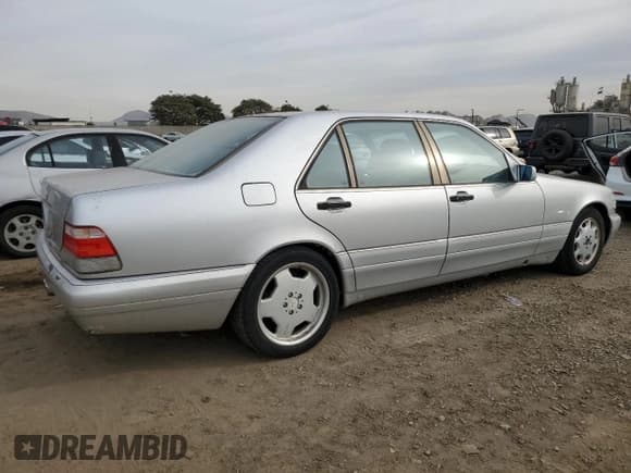 ✅ 1999 Mercedes-Benz S 320/430/500 • VIN: WDBGA33G7XA417690 • Lot: 84715404. Listed on Copart with 259,631 mi. Free auction sales archive from the USA and detailed vehicle history report at DreamBid. Image 3.