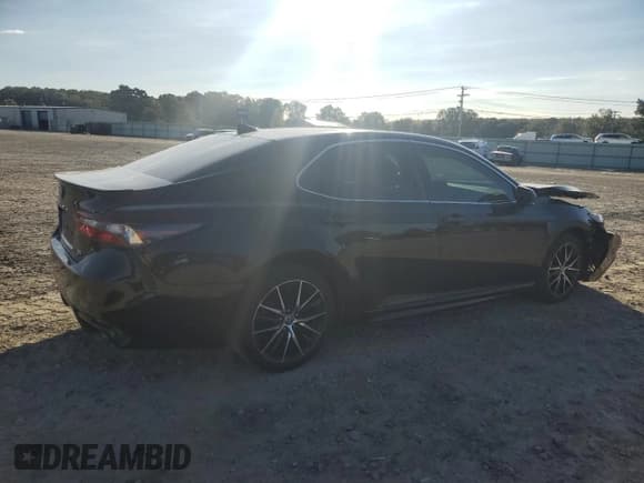 ✅ 2022 Toyota Camry SE • VIN: 4T1G11AKXNU665212 • Lot: 87469135. Listed on Copart with 77,209 mi. Free auction sales archive from the USA and detailed vehicle history report at DreamBid. Image 3.