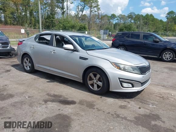 ✅ 2014 Kia Optima LX • VIN: 5XXGM4A72EG312557 • Lot: 43301197. Listed on IAAI with 158,070 mi. Free auction sales archive from the USA and detailed vehicle history report at DreamBid. Image 1.