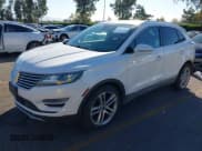 ✅ 2015 Lincoln MKC • VIN: 5LMTJ2AH6FUJ13553 • Lot: 43585464. Listed on IAAI with 136,864 mi. Free auction sales archive from the USA and detailed vehicle history report at DreamBid. Image 2.
