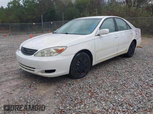 ✅ 2002 Toyota Camry LE • VIN: 4T1BE32KX2U087648 • Lot: 43799843. Listed on IAAI with 166,024 mi. Free auction sales archive from the USA and detailed vehicle history report at DreamBid. Image 2.