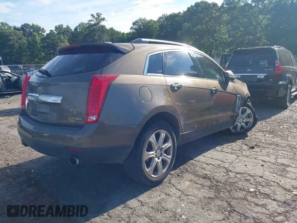 ✅ 2015 Cadillac SRX Premium Collection • VIN: 3GYFNDE36FS557383 • Lot: 43066773. Listed on IAAI with 181,029 mi. Free auction sales archive from the USA and detailed vehicle history report at DreamBid. Image 4.