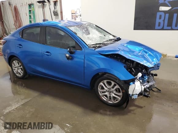 ✅ 2017 Toyota Yaris • VIN: 3MYDLBYVXHY156733 • Lot: 65355625. Listed on Copart with 90,039 mi. Free auction sales archive from the USA and detailed vehicle history report at DreamBid. Image 4.
