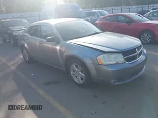 ✅ 2009 Dodge Avenger SXT • VIN: 1B3LC56B89N541857 • Lot: 42474489. Listed on IAAI with 99,606 mi. Free auction sales archive from the USA and detailed vehicle history report at DreamBid. Image 1.