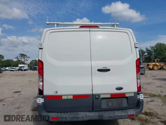 ✅ 2016 Ford Transit Cargo • VIN: 1FTYR1YM0GKA86155 • Lot: 41840237. Listed on IAAI with 192,125 mi. Free auction sales archive from the USA and detailed vehicle history report at DreamBid. Image 17.