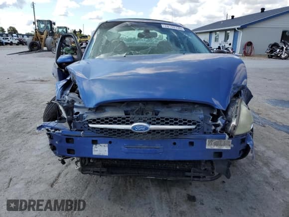 ✅ 2002 Ford Taurus SEL Deluxe • VIN: 1FAHP56S22A246619 • Lot: 70102135. Listed on Copart with 263,963 mi. Free auction sales archive from the USA and detailed vehicle history report at DreamBid. Image 5.