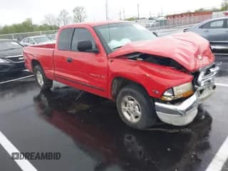 ✅ 1999 Dodge Dakota SLT • VIN: 1B7GL22X3XS155894 • Lot: 41938830. Wystawiony na IAAI z przebiegiem 224 068 mil. Bezpłatny archiwum sprzedaży aukcyjnych z USA i szczegółowy raport historii pojazdu na DreamBid. Zdjęcie 1.