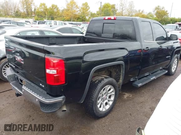 ✅ 2018 GMC Sierra 1500 SLE • VIN: 1GTV2MEC1JZ297061 • Lot: 43569940. Listed on IAAI with 182,917 mi. Free auction sales archive from the USA and detailed vehicle history report at DreamBid. Image 4.