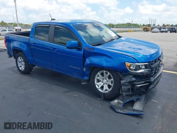 ✅ 2021 Chevrolet Colorado 2WD LT • VIN: 1GCGSCEN9M1245605 • Lot: 42546439. Listed on IAAI with 53,922 mi. Free auction sales archive from the USA and detailed vehicle history report at DreamBid. Image 1.