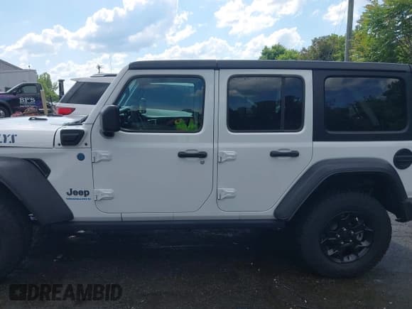 ✅ 2023 Jeep Wrangler • VIN: 1C4JJXN67PW630869 • Lot: 42170206. Wystawiony na IAAI z przebiegiem 56 384 mil. Bezpłatny archiwum sprzedaży aukcyjnych z USA i szczegółowy raport historii pojazdu na DreamBid. Zdjęcie 14.
