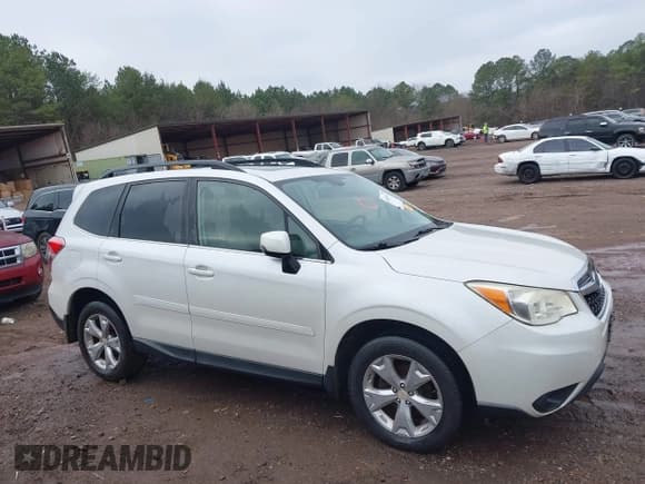 ✅ 2014 Subaru Forester Touring • VIN: JF2SJAPC5EH425252 • Lot: 43847572. Listed on IAAI with 213,349 mi. Free auction sales archive from the USA and detailed vehicle history report at DreamBid. Image 13.