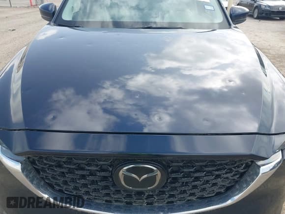 ✅ 2023 Mazda CX-5 S Carbon Edition • VIN: JM3KFBCM6P0165036 • Lot: 42622732. Listed on IAAI with 44,497 mi. Free auction sales archive from the USA and detailed vehicle history report at DreamBid. Image 18.