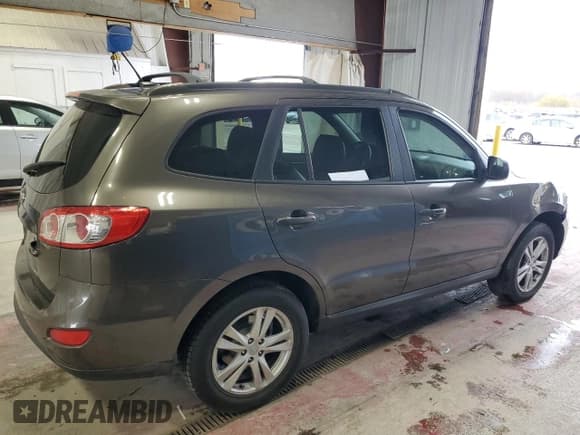 ✅ 2012 Hyundai Santa Fe SE • VIN: 5XYZH4AG6CG135162 • Lot: 79197764. Listed on Copart with 87,661 mi. Free auction sales archive from the USA and detailed vehicle history report at DreamBid. Image 3.