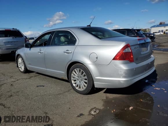 ✅ 2011 Ford Fusion Hybrid • VIN: 3FADP0L3XBR345662 • Лот: 89449145. Опубликован ранее на Copart с пробегом 110 940 миль. Бесплатный доступ к архиву аукционных продаж из США и подробный отчёт об истории автомобиля на DreamBid. Изображение 2.