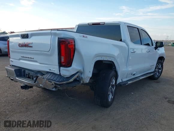 ✅ 2022 GMC Sierra 1500 SLT • VIN: 3GTUUDED9NG637299 • Lot: 43056400. Listed on IAAI with 70,985 mi. Free auction sales archive from the USA and detailed vehicle history report at DreamBid. Image 4.