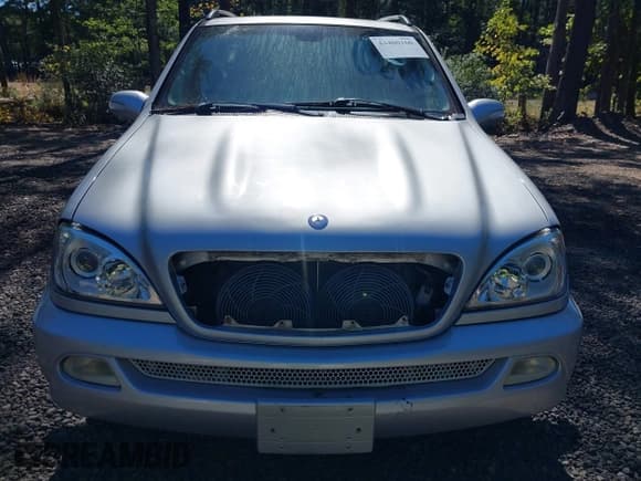 ✅ 2005 Mercedes-Benz M 350 • VIN: 4JGAB57E65A559207 • Lot: 43400160. Listed on IAAI with 197,712 mi. Free auction sales archive from the USA and detailed vehicle history report at DreamBid. Image 6.