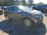 ✅ 2018 Chevrolet Equinox Premier • VIN: 3GNAXPEU6JS591795 • Лот: 85390305. Опубликован ранее на Copart с пробегом 187 641 миль. Бесплатный доступ к архиву аукционных продаж из США и подробный отчёт об истории автомобиля на DreamBid. Изображение 4.