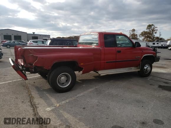 ✅ 2002 Dodge 3500 • VIN: 3B7MF33652M205850 • Lot: 76749504. Listed on Copart with 220,734 mi. Free auction sales archive from the USA and detailed vehicle history report at DreamBid. Image 3.
