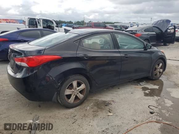 2013 Hyundai Elantra GLS z VIN KMHDH4AE9DU879388, wystawiony jako Copart lot #85315495 z przebiegiem 122 355 mil mil oraz Szkoda całkowita • Salvage title. Historia ofert i sprzedaży dostępna na DreamBid. Obrazek 3.