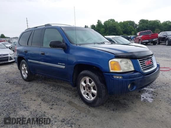 ✅ 2006 GMC Envoy SLE • VIN: 1GKDT13S362300659 • Lot: 42376597. Listed on IAAI with 261,316 mi. Free auction sales archive from the USA and detailed vehicle history report at DreamBid. Image 1.