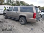 ✅ 2007 Chevrolet Suburban LTZ • VIN: 1GNFC16077J326498 • Lot: 43657422. Listed on IAAI with 252,671 mi. Free auction sales archive from the USA and detailed vehicle history report at DreamBid. Image 3.
