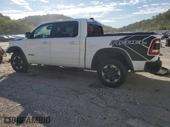 2020 Ram 1500 Rebel z VIN 1C6SRFLT4LN211966, wystawiony jako Copart lot #80487845 z przebiegiem 97 530 mil mil oraz Szkoda całkowita • Salvage title. Historia ofert i sprzedaży dostępna na DreamBid. Obrazek 2.