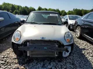 2013 MINI Hardtop with VIN WMWSU3C57DT546947, listed as a Copart auction lot 62088645 with 99,944 mi miles and Salvage title. Bid and sale history available at DreamBid. Image 5.