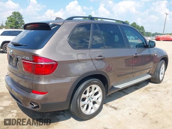 ✅ 2012 BMW X5 35i • VIN: 5UXZV4C51CL762181 • Lot: 43234239. Listed on IAAI with 74,175 mi. Free auction sales archive from the USA and detailed vehicle history report at DreamBid. Image 4.