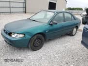 ✅ 1997 Ford Escort LX • VIN: 1FALP13P1VW274972 • Lot: 69434745. Listed on Copart with 185,562 mi. Free auction sales archive from the USA and detailed vehicle history report at DreamBid. Image 1.