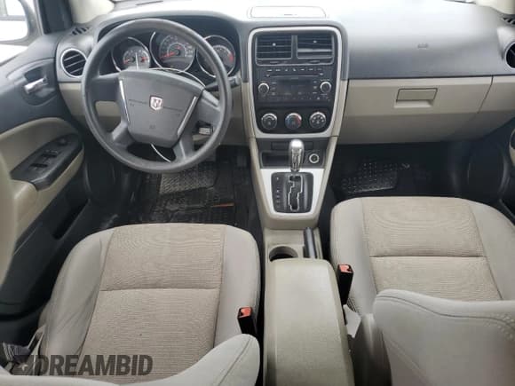 ✅ 2010 Dodge Caliber SXT • VIN: 1B3CB4HA9AD617985 • Лот: 79630514. Опубликован ранее на Copart с пробегом 249 554 миль. Бесплатный доступ к архиву аукционных продаж из США и подробный отчёт об истории автомобиля на DreamBid. Изображение 8.