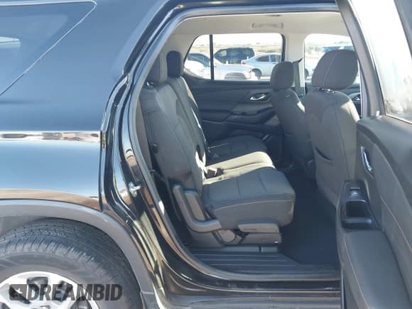 ✅ 2020 Chevrolet Traverse LS • VIN: 1GNERFKW6LJ272073 • Lot: 43304588. Listed on IAAI with 86,594 mi. Free auction sales archive from the USA and detailed vehicle history report at DreamBid. Image 8.