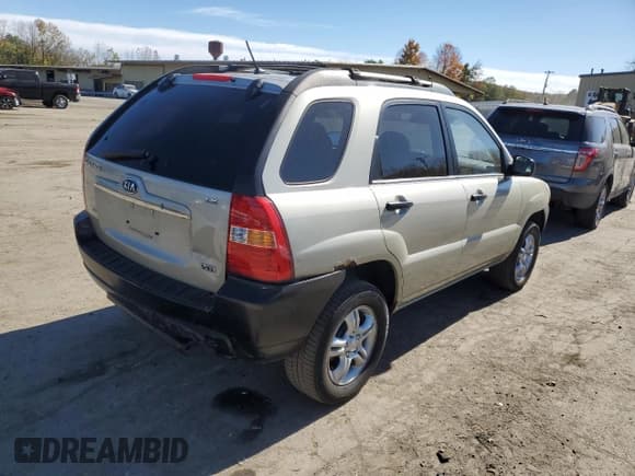 ✅ 2007 Kia Sportage EX • VIN: KNDJF723X77437802 • Лот: 76077474. Опубликован ранее на Copart с пробегом 119 281 миль. Бесплатный доступ к архиву аукционных продаж из США и подробный отчёт об истории автомобиля на DreamBid. Изображение 3.
