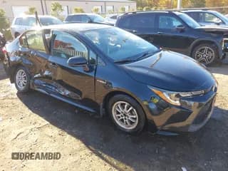 ✅ 2021 Toyota Corolla Hybrid LE • VIN: JTDEAMDEXMJ009742 • Lot: 43595982. Listed on IAAI with 93,333 mi. Free auction sales archive from the USA and detailed vehicle history report at DreamBid. Image 1.
