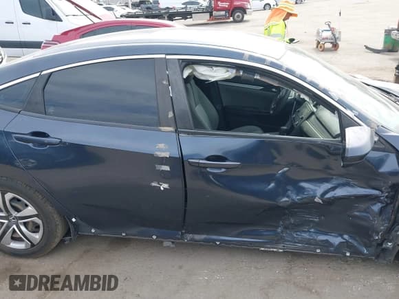 ✅ 2016 Honda Civic LX • VIN: 19XFC2F51GE206090 • Lot: 43100920. Listed on IAAI with 120,554 mi. Free auction sales archive from the USA and detailed vehicle history report at DreamBid. Image 13.