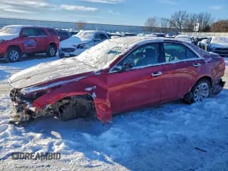 ✅ 2014 Cadillac CTS AWD • VIN: 1G6AW5SX0E0153692 • Lot: 95268415. Listed on Copart with 125,916 mi. Free auction sales archive from the USA and detailed vehicle history report at DreamBid. Image 1.