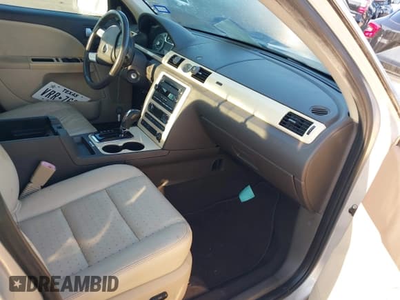 ✅ 2009 Mercury Sable Premier • VIN: 1MEHM42W69G614697 • Lot: 43121944. Listed on IAAI with 137,715 mi. Free auction sales archive from the USA and detailed vehicle history report at DreamBid. Image 5.