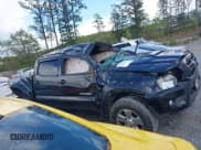 ✅ 2014 Toyota Tacoma PreRunner • VIN: 5TFJU4GN8EX057773 • Lot: 42020511. Listed on IAAI with 228,730 mi. Free auction sales archive from the USA and detailed vehicle history report at DreamBid. Image 12.