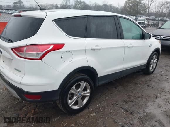 ✅ 2013 Ford Escape SE • VIN: 1FMCU0GX4DUA74049 • Lot: 43864308. Listed on IAAI with 169,025 mi. Free auction sales archive from the USA and detailed vehicle history report at DreamBid. Image 4.