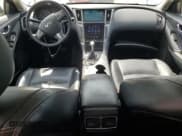 ✅ 2014 Infiniti Q50 Hybrid Premium • VIN: JN1AV7ARXEM703037 • Lot: 69222845. Listed on Copart with 154,519 mi. Free auction sales archive from the USA and detailed vehicle history report at DreamBid. Image 8.