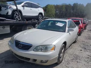 ✅ 2001 Mazda Millenia • VIN: JM1TA221011711379 • Lot: 41897580. Wystawiony na IAAI z przebiegiem 151 307 mil. Bezpłatny archiwum sprzedaży aukcyjnych z USA i szczegółowy raport historii pojazdu na DreamBid. Zdjęcie 2.